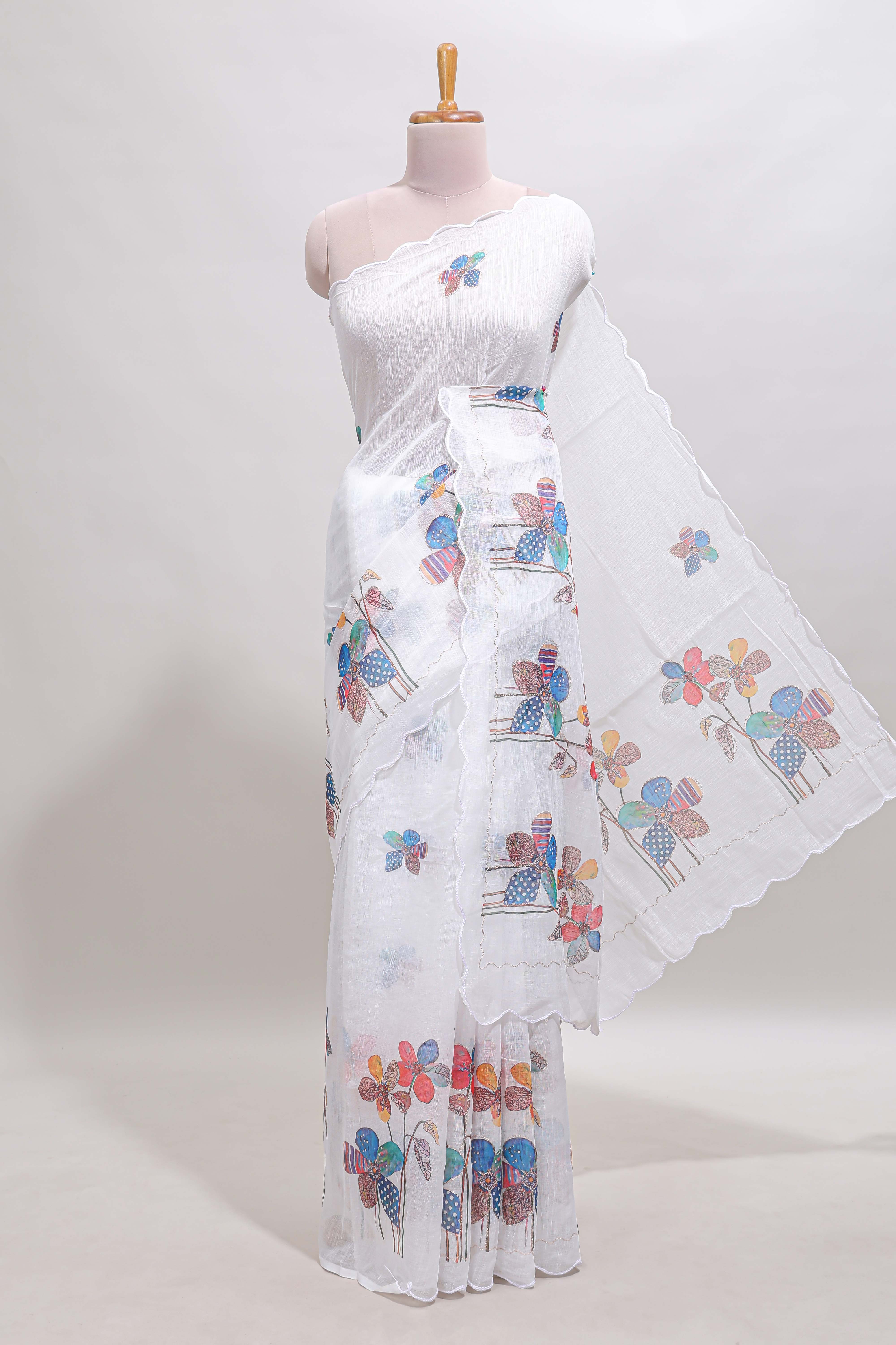 White floral design linen cotton saree with scallop border and matching printed blouse