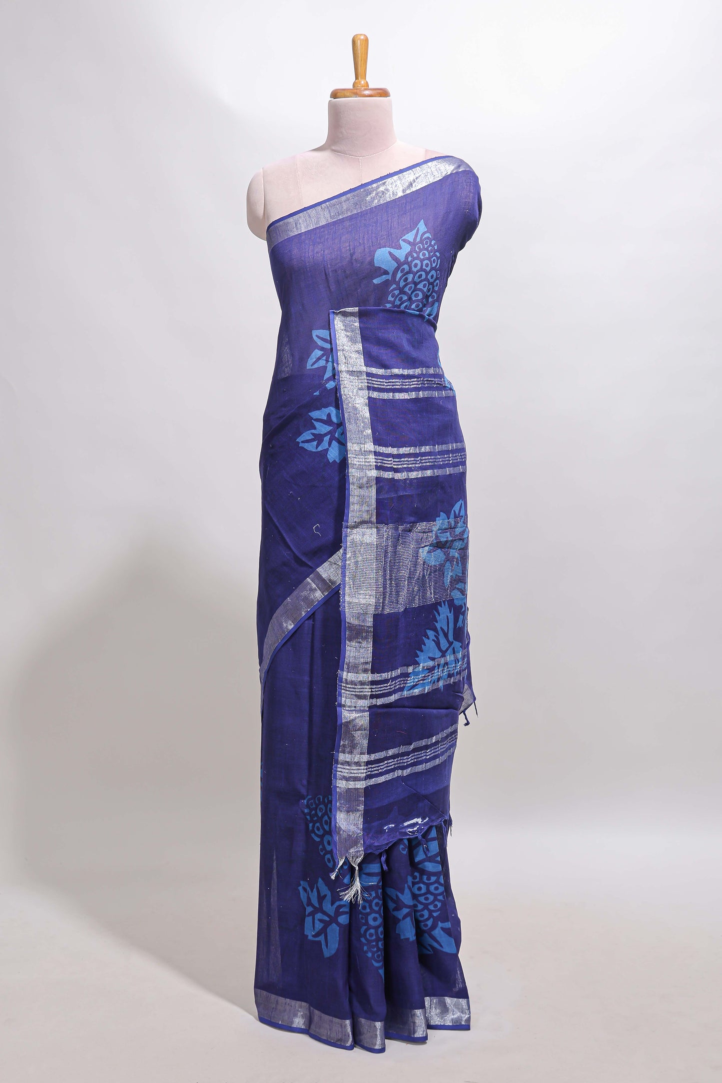 Blue floral design linen cotton saree with self zari border and matching plain blouse