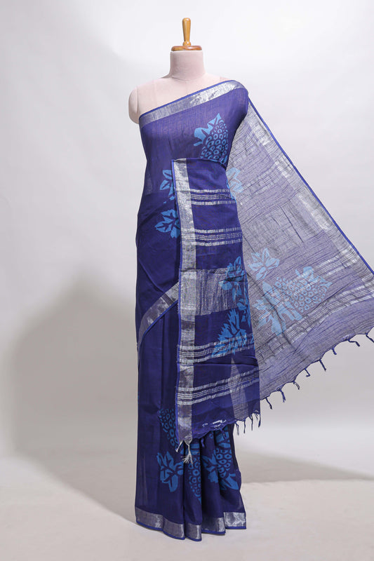 Blue floral design linen cotton saree with self zari border and matching plain blouse