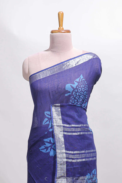 Blue floral design linen cotton saree with self zari border and matching plain blouse