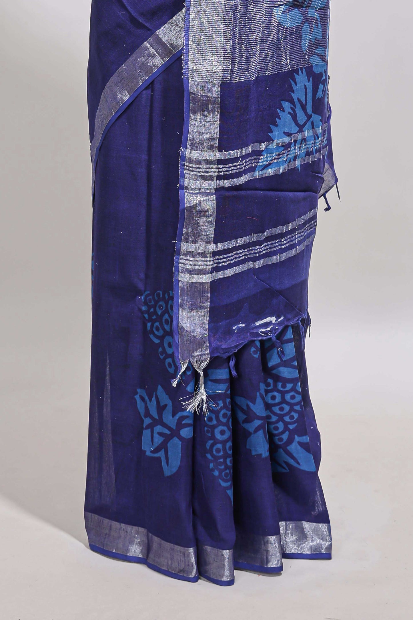 Blue floral design linen cotton saree with self zari border and matching plain blouse