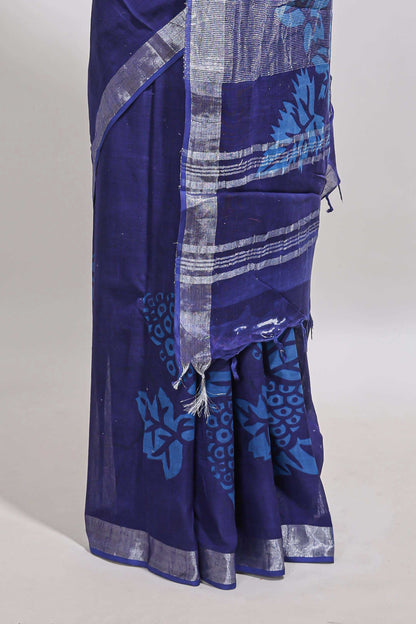 Blue floral design linen cotton saree with self zari border and matching plain blouse