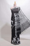 Black floral design linen cotton saree with self zari border and matching plain blouse