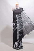Black floral design linen cotton saree with self zari border and matching plain blouse