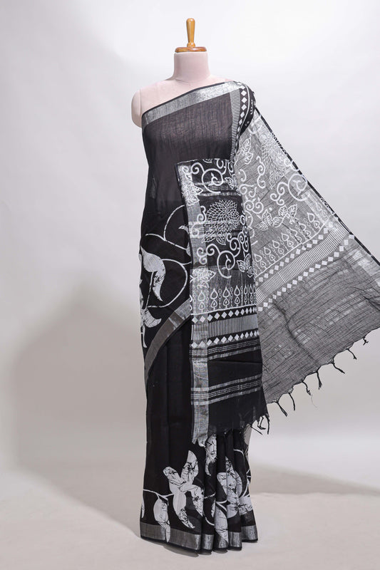 Black floral design linen cotton saree with self zari border and matching plain blouse