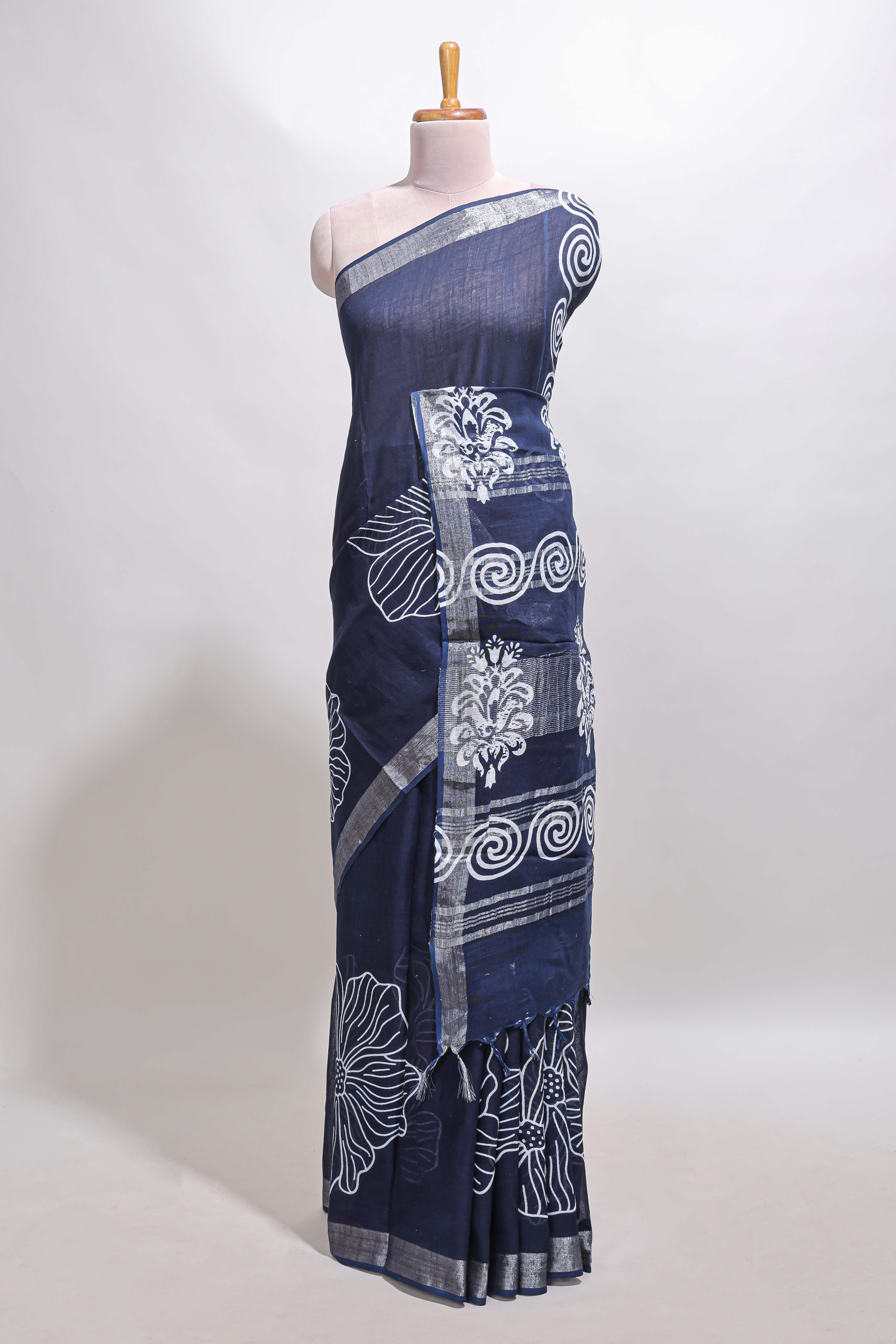 Dark blue floral design linen cotton saree with self zari border and matching plain blouse