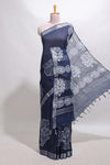 Dark blue floral design linen cotton saree with self zari border and matching plain blouse
