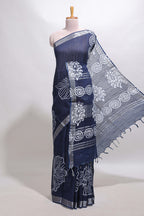 Dark blue floral design linen cotton saree with self zari border and matching plain blouse