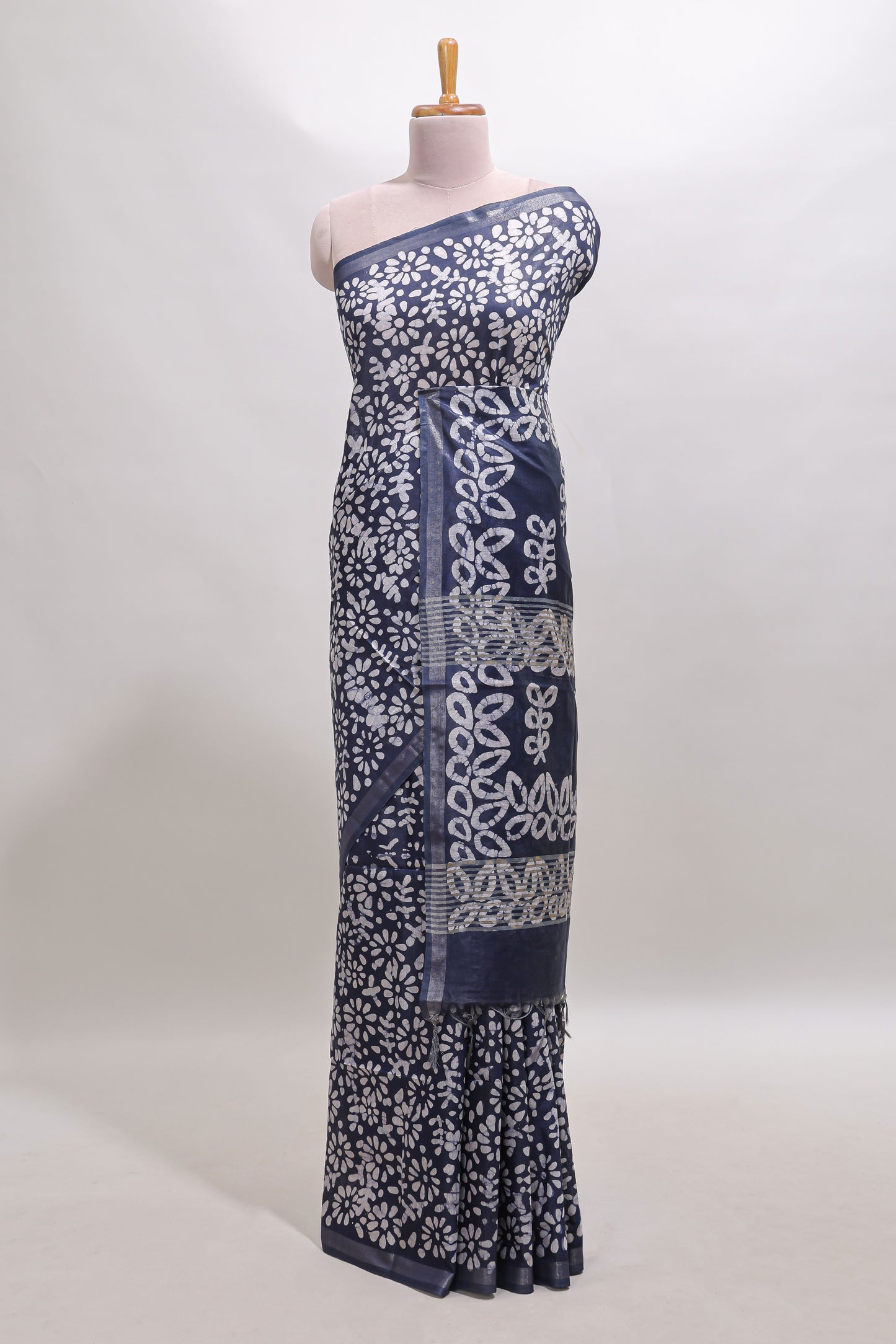 Dark blue floral design linen cotton saree with self zari border and matching blouse