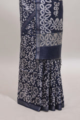Dark blue floral design linen cotton saree with self zari border and matching blouse