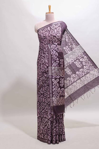 Dark purple floral design linen cotton saree with self zari border and matching blouse