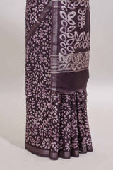 Dark purple floral design linen cotton saree with self zari border and matching blouse