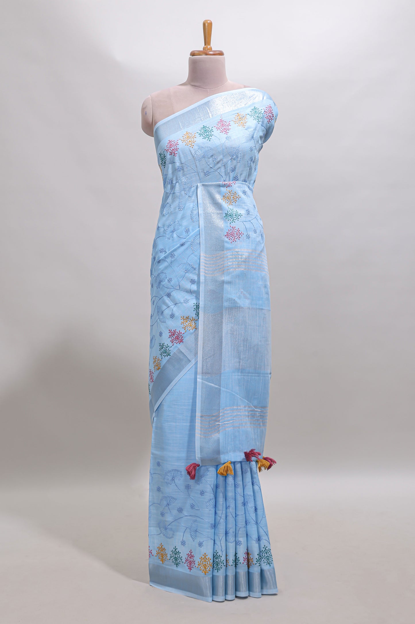 Blue embroidery floral design linen cotton saree with self zari border and matching blouse