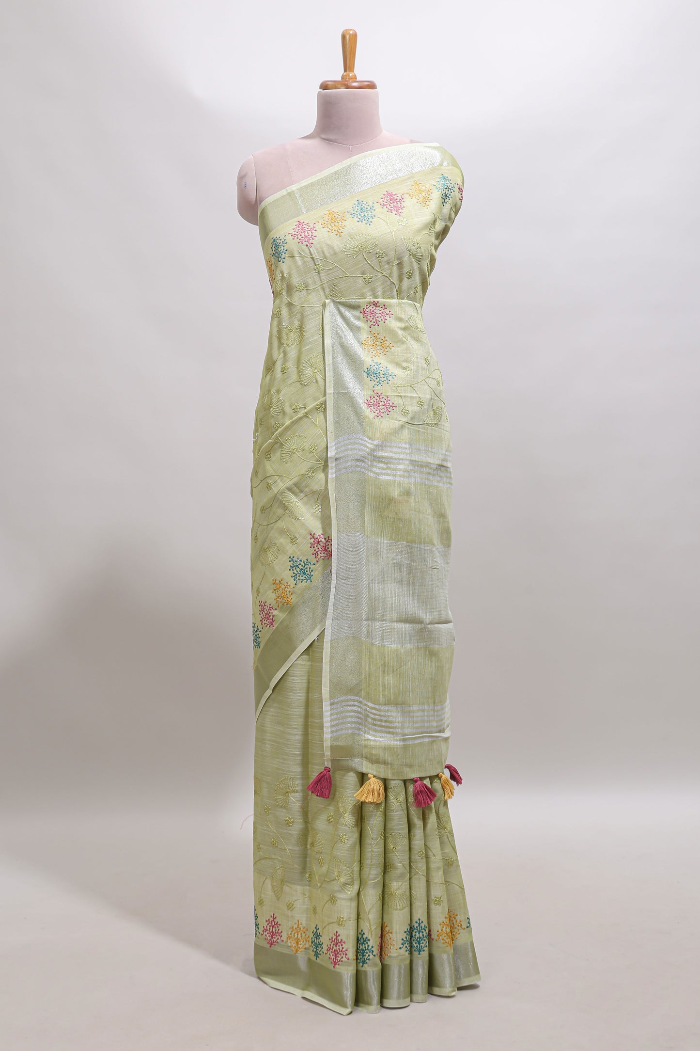 Green embroidery floral design linen cotton saree with self zari border and matching blouse