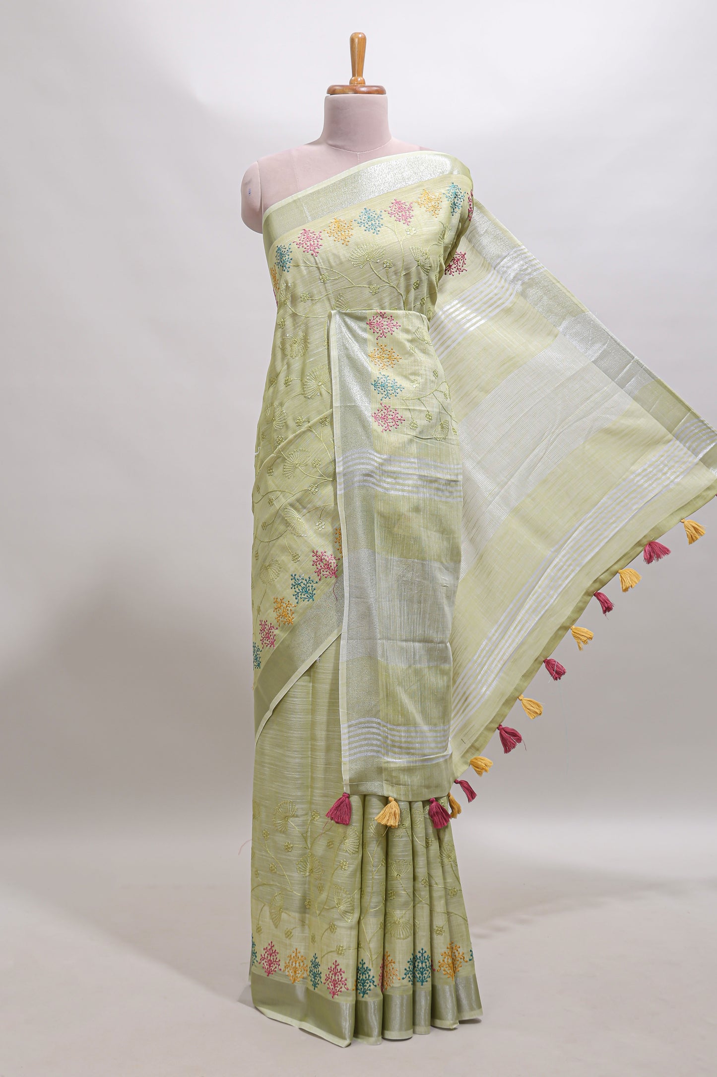 Green embroidery floral design linen cotton saree with self zari border and matching blouse