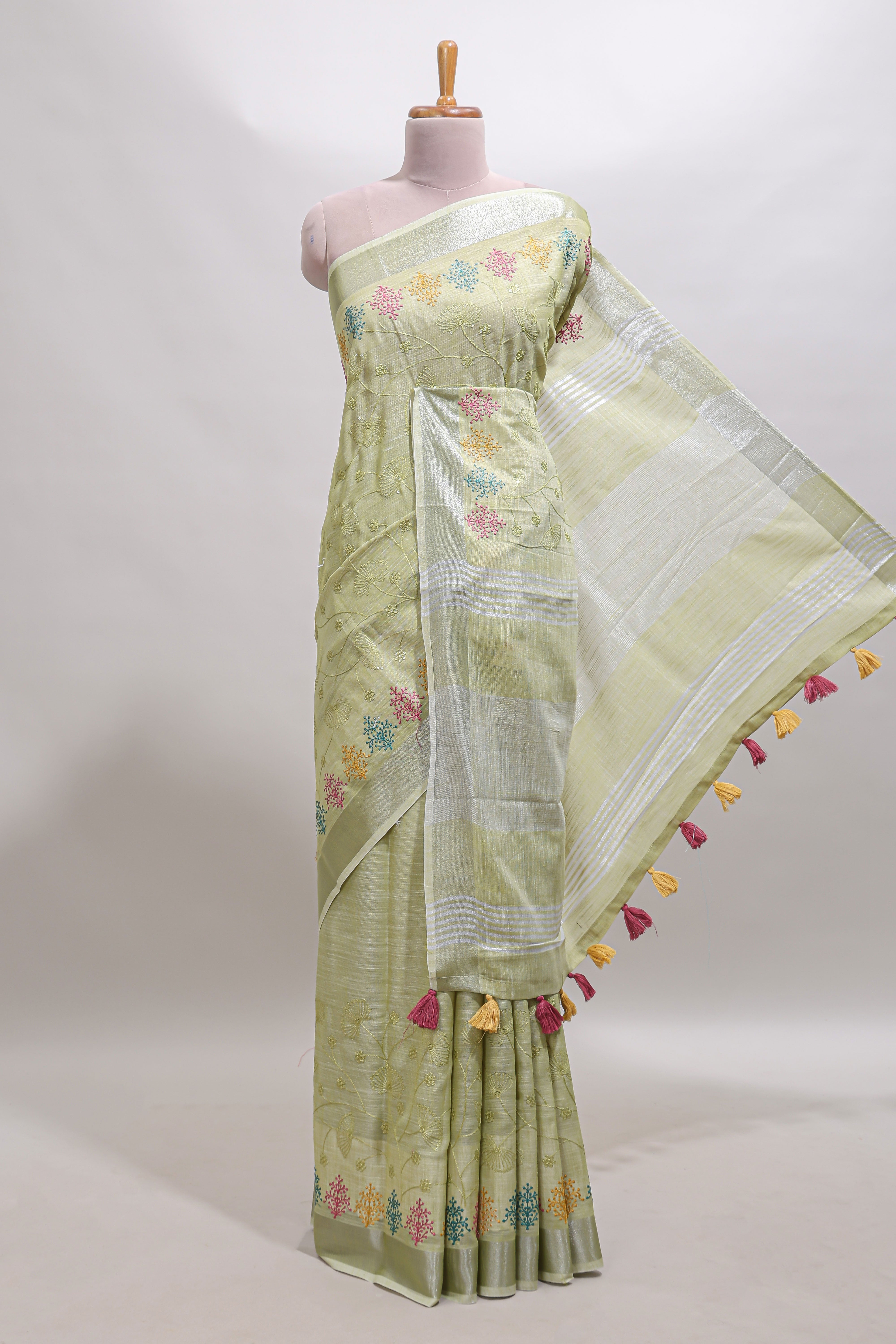 Green embroidery floral design linen cotton saree with self zari border and matching blouse