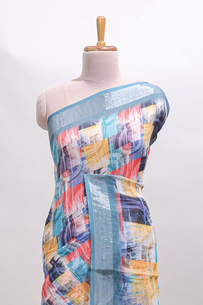 Multi color geometric design linen cotton saree with contrast zari border and matching blouse