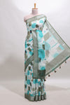 Multi color geometric design linen cotton saree with contrast zari border and matching blouse