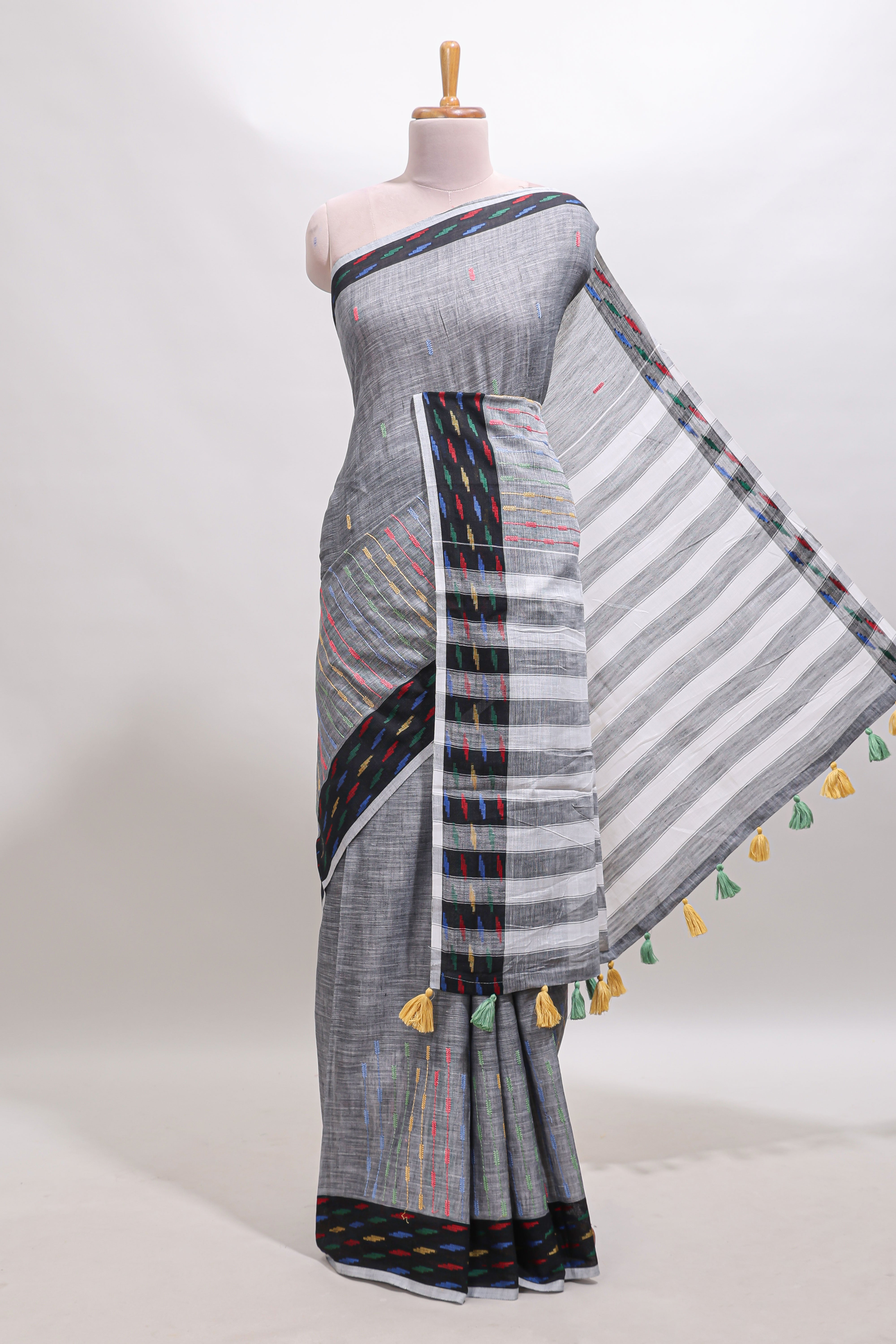 Grey thread butta linen cotton saree with contrast border and striped pallu