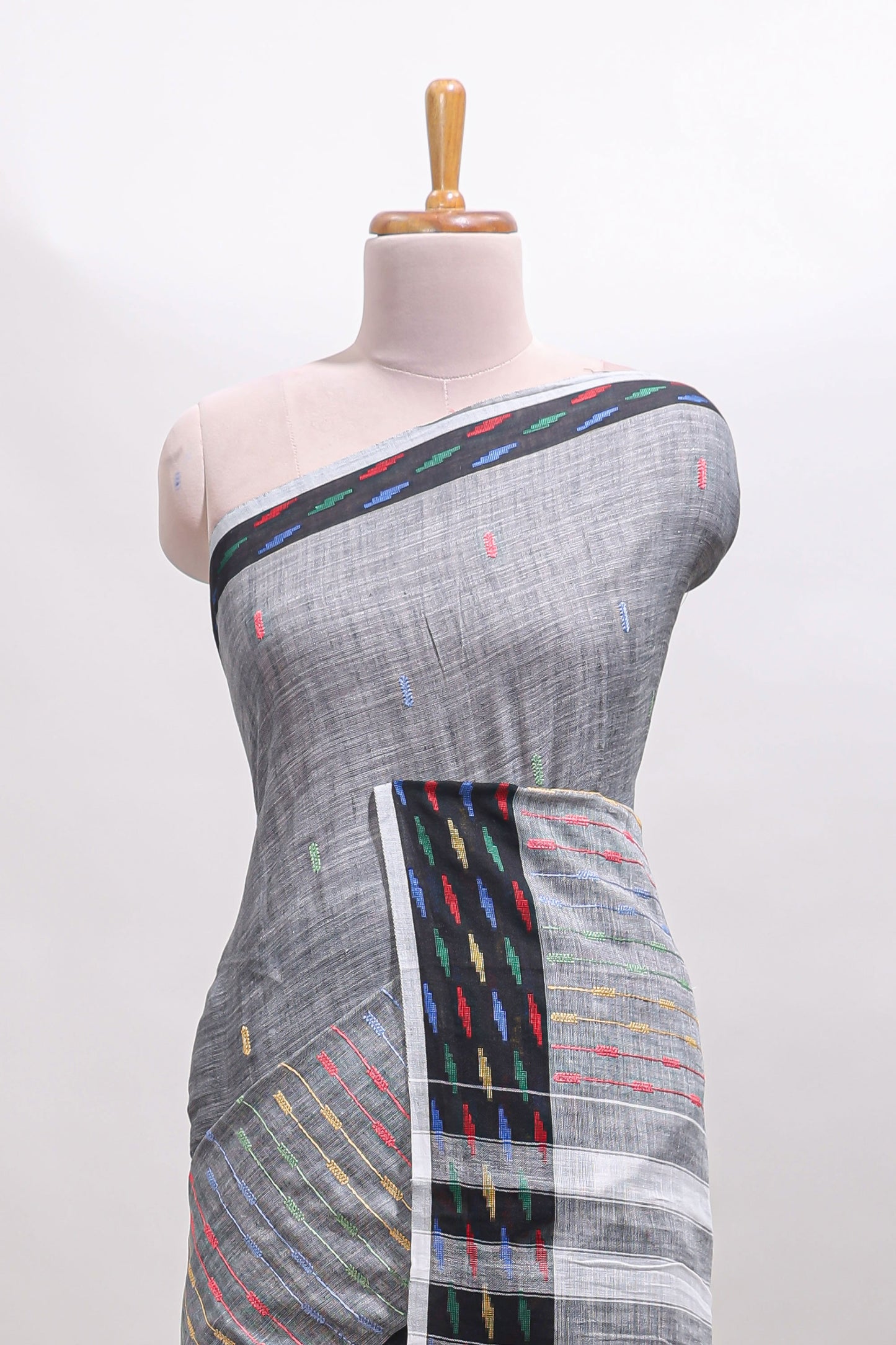 Grey thread butta linen cotton saree with contrast border and striped pallu