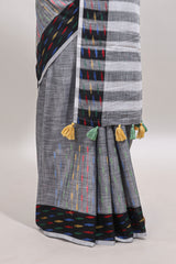 Grey thread butta linen cotton saree with contrast border and striped pallu