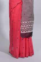 Coral pink linen cotton saree with  sequin details striped and geometric zigzag pallu with scallop border along with striped blouse