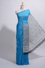 Blue linen cotton saree withsequin details striped and geometric zigzag pallu with scallop border along with striped blouse