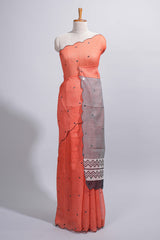 Orange linen cotton saree withsequin details striped and geometric zigzag pallu with scallop border along with striped blouse