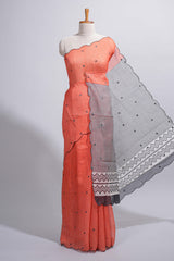 Orange linen cotton saree withsequin details striped and geometric zigzag pallu with scallop border along with striped blouse