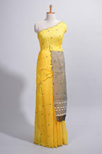 Yellow linen cotton saree with  sequin details striped and geometric zigzag pallu with scallop border along with striped blouse