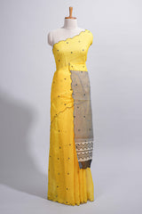 Yellow linen cotton saree withsequin details striped and geometric zigzag pallu with scallop border along with striped blouse