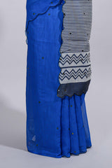 Royal blue linen cotton saree withsequin details striped and geometric zigzag pallu with scallop border along with striped blouse
