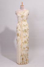 Cream floral design linen cotton saree with self zari border and matching printed blouse