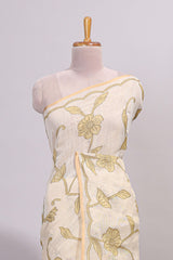 Cream floral design linen cotton saree with self zari border and matching printed blouse