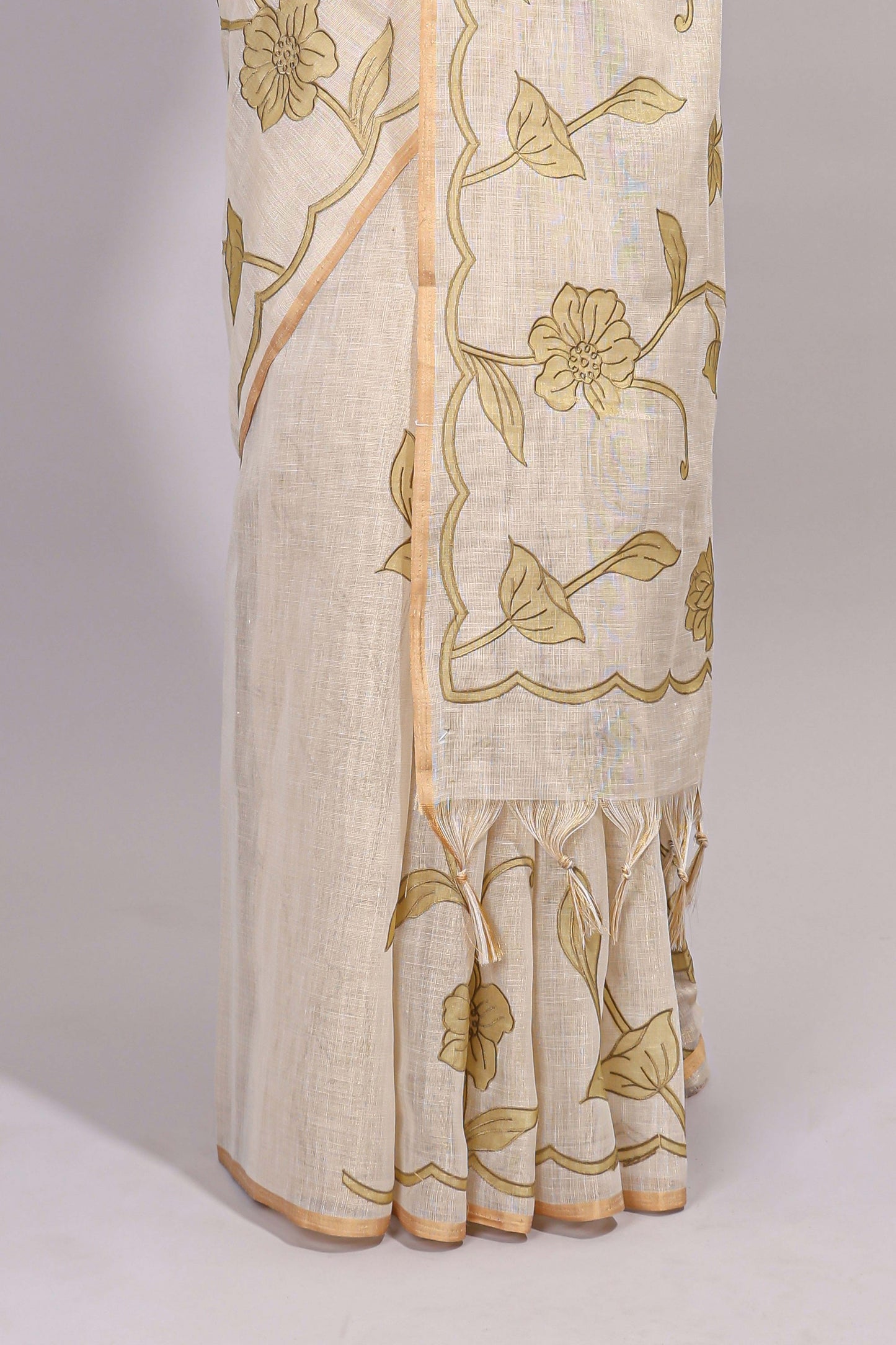Cream floral design linen cotton saree with self zari border and matching printed blouse