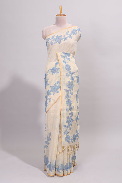 Cream floral design linen cotton saree with self zari border and matching printed blouse