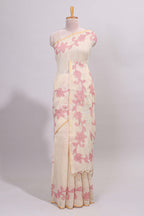 Cream floral design linen cotton saree with self zari border and matching printed blouse