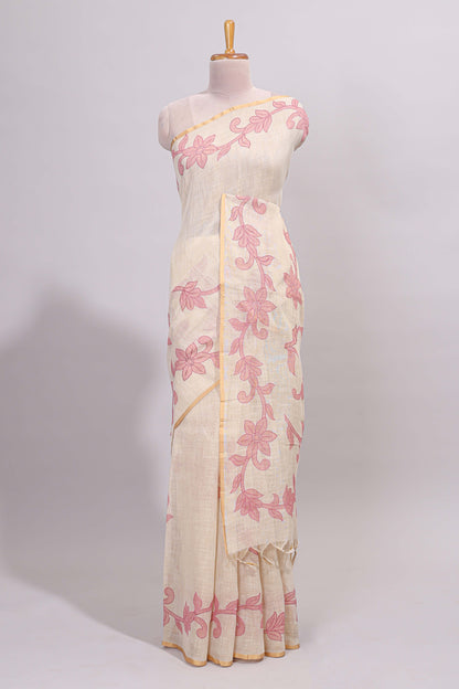 Cream floral design linen cotton saree with self zari border and matching printed blouse