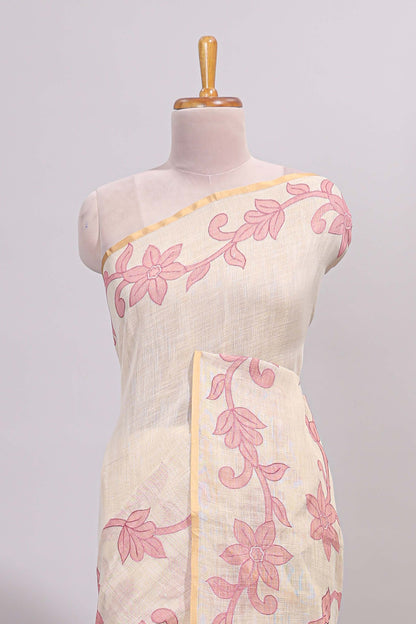 Cream floral design linen cotton saree with self zari border and matching printed blouse