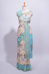 Pastel blue and beige linen cotton saree with animal motifs striped zari border and printed pallu with tassel along with contrast blouse