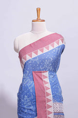 Blue linen small dotted elephant and floral motifs contrast border and printed pallu with geometric patterns and tassel detailing along with printed blouse