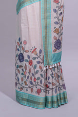 Elegant linen cotton saree with multicolourfloral vine print with a contrast border and printed pallu along with printed blouse
