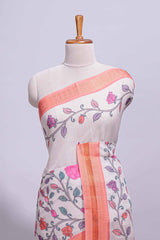 Ivory with orange linen cotton saree with multicolourfloral vine print with a contrast border and printed pallu along with printed blouse