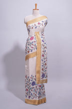 Ivory with yellow linen cotton saree with multicolour  floral vine print with a contrast border and printed pallu along with printed blouse