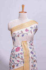 Ivory with yellow linen cotton saree with multicolourfloral vine print with a contrast border and printed pallu along with printed blouse