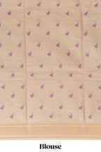 Ivory with yellow linen cotton saree with multicolour  floral vine print with a contrast border and printed pallu along with printed blouse