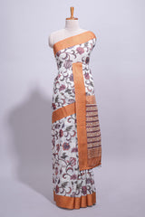 White with orange linen cotton saree with multicolourfloral vine print with a contrast border and printed pallu along with printed blouse
