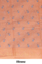 White with orange linen cotton saree with multicolour  floral vine print with a contrast border and printed pallu along with printed blouse