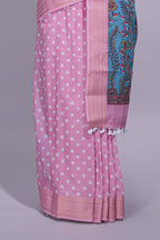 Pink linen saree white polka dot pattern all over the body and self zari border with printed pallu along with printed blouse