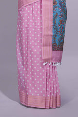 Pink linen saree white polka dot pattern all over the body and self zari border with printed pallu along with printed blouse